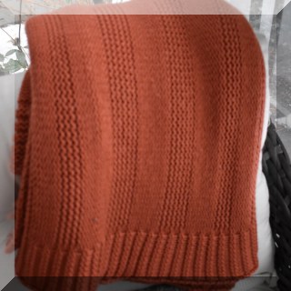 D57 Orange knit throw. - $18